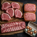 The Cookout Bundle: five boneless pork chops, 2 lb ground pork, spare ribs, and a dozen pasture-raised eggs